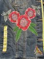 Animal collage patchwork upcycled Jean jacket. 
